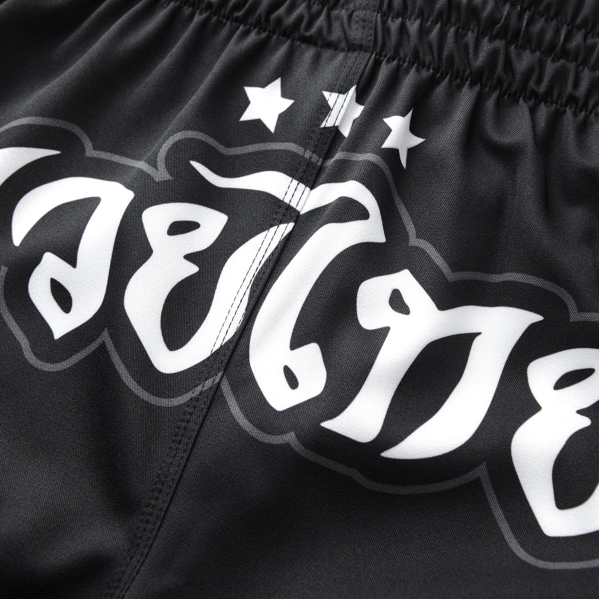 Fightshorts REVOLUTION Muay Thai - Schwarz