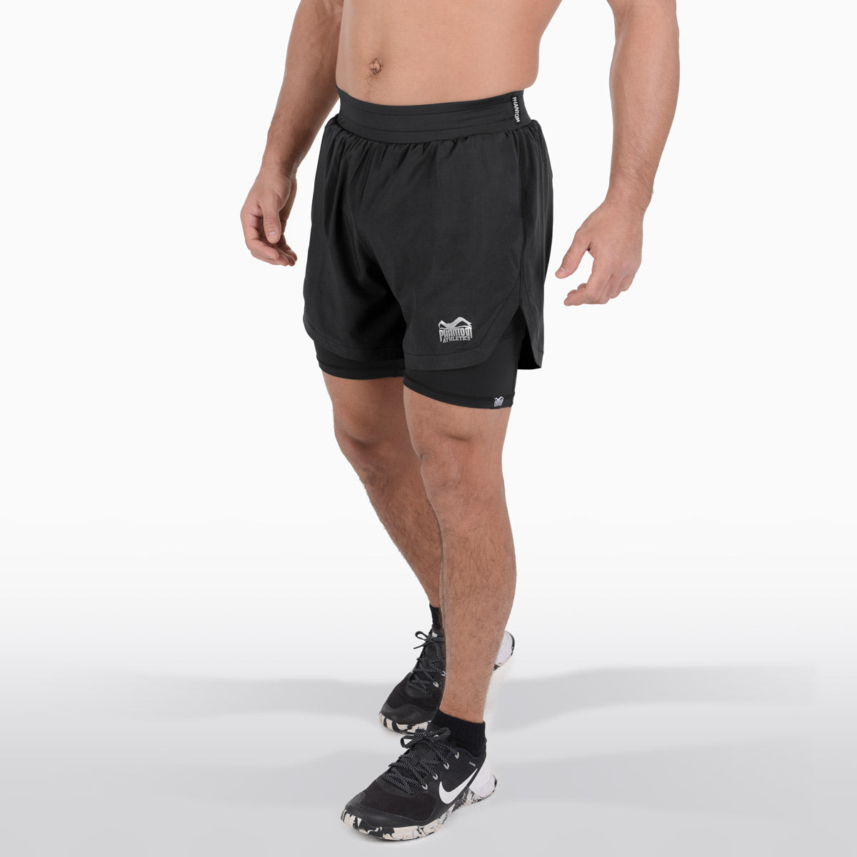 Phantom MMA Fightshorts Laser X mit inkludierter Compressions Hose für maximalen Tragekomfort. Perfekt für dein MMA, BJJ oder Muay Thai Kampfsport Training.